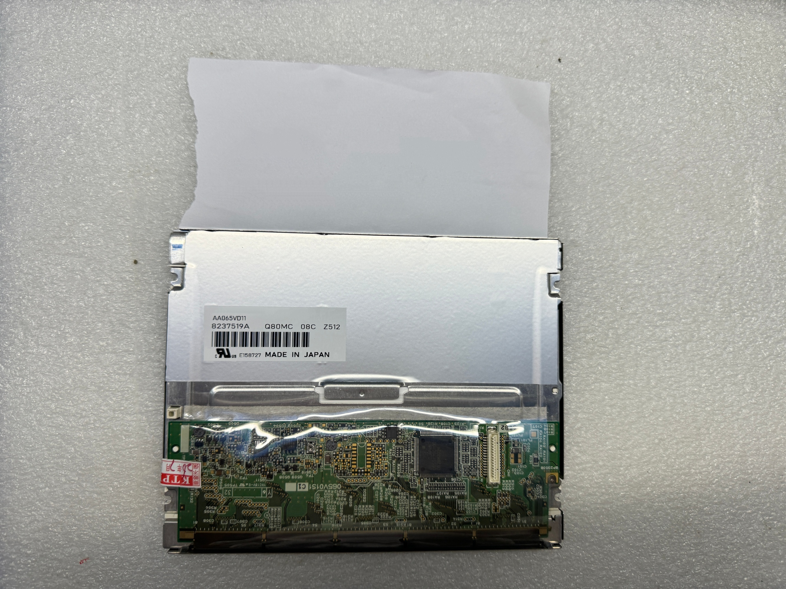 AA065VD11 rear-view reference with model label and circuit board