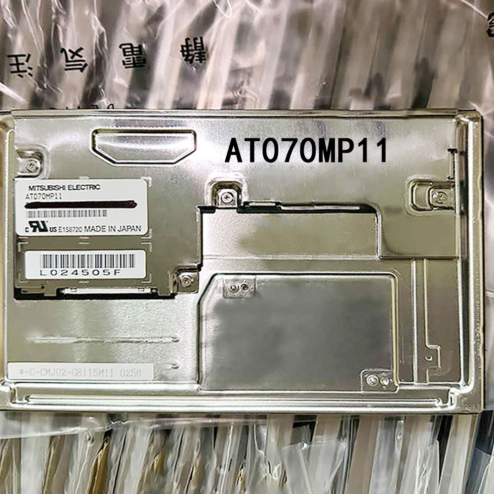 AT070MP11 rear-view reference with model label and circuit board
